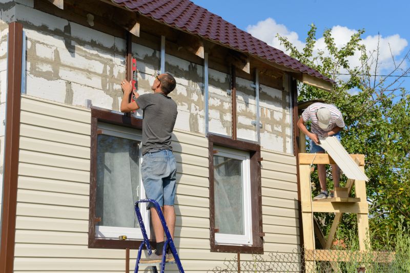 Professional Vinyl Siding Repair in Action